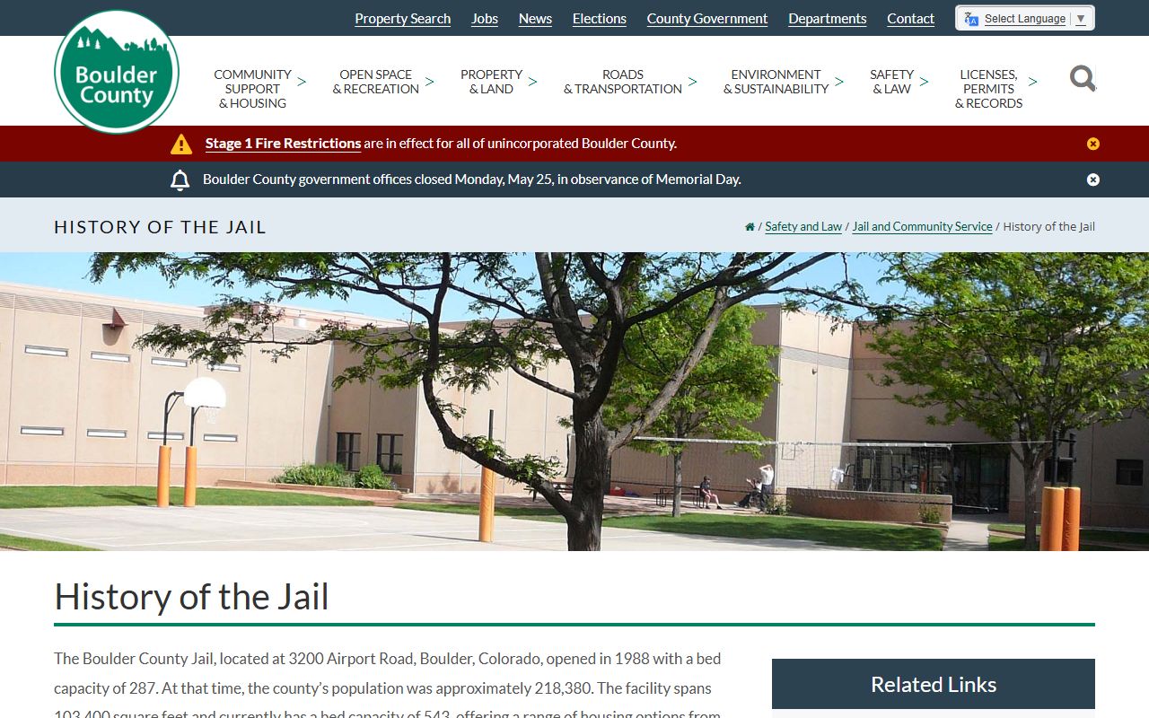 Boulder County Jail history page showing 543 current bed capacity and prior expansions